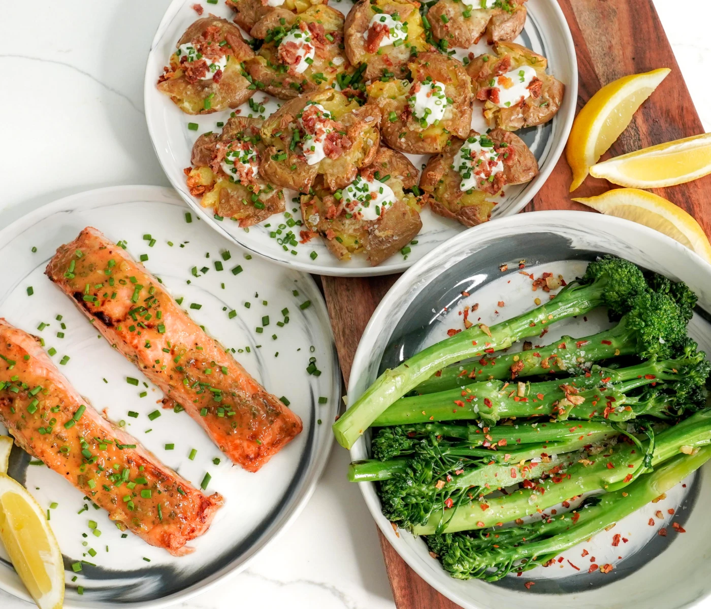 Mustard glazed salmon with crispy baked potato bites and garlic broccolini.